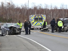 Ontario Provincial Police investigate a fatal collision at Middle Lake Road and the Highway 17 southwest bypass in Sudbury, Ont. on Wednesday November 8, 2017. John Lappa/Sudbury Star/Postmedia Network