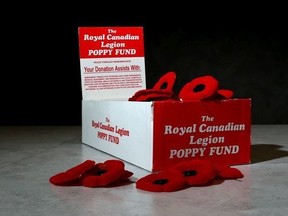 A Royal Canadian Legion poppy donation box is photographed on November 3, 2014. (Mike Dibattista, Postmedia Network)