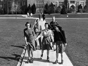 As the Second World War intensified, gasoline rationing forced students to abandon their cars and seek alternate transportation. Coeds Ruth Johnson (left), Peggy Lang and Mary Scott were typical of the many who adopted roller skates to get around campus. In the background (left) is Leo La Fontcini also on skates and Kenrick Gunn whose shiny new bicycle replaced the car he drove daily to campus. (The London Free Press Collection of Photographic Negatives, Western Archives, Western University)