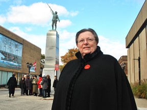 IODE national president Bonnie Rees is shown at the downtown Chatham cenotaph on Nov. 7. Rees visited as part of a 150-hour vigil at the cenotaph leading up to Remembrance Day organized by Christ Church. Representatives from the four local IODE chapters participated.