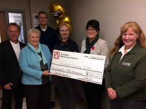 TMMC donated $150,000 on Thursday to the Oxford County Community Health Centre to fund a dental clinic for low-income residents. From left Randy Peltz, Ann Campbell, Jeff Small, Ray McFalls, Stephanie Pollard and Suzanne Baal. (HEATHER RIVERS, Sentinel-Review)