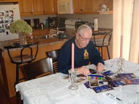 Richard Babcock said he enjoys looking at photos and other memorabilia of his father, Lt. Col. Harry Babcock, for whom the Napanee Legion building was named. CHRISTINE PEETS/FOR POSTMEDIA NETWORK