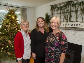 June Hale, designer Katlin Sumner and Laura Potter are part of the team organizing the Poplar Hill Christmas home tour. (MIKE HENSEN, The London Free Press)