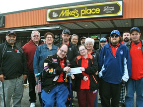 From left to right are Jake Baylis, Mike Buckler, Brenda Buckler, Donald Nash, Steve French, John Brooks, Terry Marie Haskell, Jerome Kaza, Beatrice Stacey, Randy Haskell, Gerald Haskell, Michael Peterson and John Krahn.