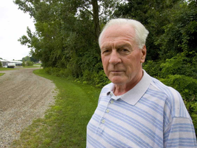 Bernie Crane, the first police officer to arrive after Lynda Shaw's body was found in 1990, is shown in this 2005 Free Press photo at the scene near Highway 401. He died this week at age 89.