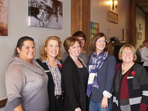 Stony Plain MLA Erin Babcock (left) poses with Linda Matties (centre left), Dara Choy (centre), Minister Stephanie McLean (centre right) and Judy Bennett (right). - Photo by Keenan Sorokan
