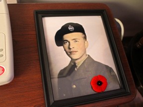 A portrait of Bob when he first joined the Royal Marines hangs in his bedroom. - Photo by Keenan Sorokan