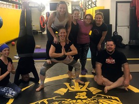 Jenny, Serena, Stephanie, Amey, Kate, Libby and Bee join columnist Jan Murphy after a session of yoga at Average Joe Yoga.