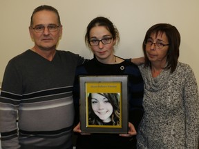 Family members of 22-year-old Alexie Dallaire-Vincent were at the district courthouse in Timmins Thursday and Friday to witness the inquest into the sudden death of the young miner who is believed to be the first woman to die in an Ontario mine. Alexie’s father Mario Vincent, left, her sister Emmanuelle Dallaire-Vincent holding Alexie’s portrait, and her mom Marcelle Dallaire said they are pleased with the recommendations by the inquest jury.