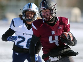 Ethan Martin of the South Lions runs for more yards during the first quarter of their semi-final game against Lucas at TD stadium on Friday November 10, 2017. South led 28-0 after the first quarter and 50-0 at the half. South was able to run at will, while Lucas' offence was unable to move the ball. Mike Hensen/The London Free Press/Postmedia Network