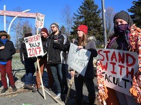A small group of Cambrian College students hold a rally at the main entrance to the college to show their support for striking faculty in Sudbury, Ont. on Friday November 10, 2017. John Lappa/Sudbury Star/Postmedia Network