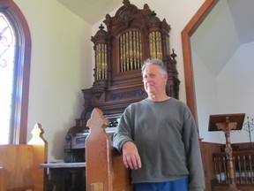 David Pattenden, a volunteer and a board member with the Moore Museum, stands next to its restored 1881 Dominion reed organ in the museum's Trinity St. Clair Chapel. The museum is hosting a Christmas organ concert Nov. 24, 7 p.m. Tickets, $20 for adults and $10 for children, are available from the museum in Mooretown.
Paul Morden/Sarnia Observer/Postmedia Network