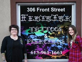 Tim Miller/The Intelligencer
Body piercer Stacey Maracle (left) and tattoo artist Faye stand out front of their Front Street shop on Friday in Belleville. The pair own and operate the city's only all-female tattoo and piercing parlour.