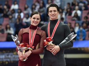 Tessa Virtue of London and Scott Moir of Ilderton took gold with 198.64 points in ice dance at the NHK Trophy on Sunday in Osaka, Japan. (NOGIKAZUHIRO NOGI/Getty Images)