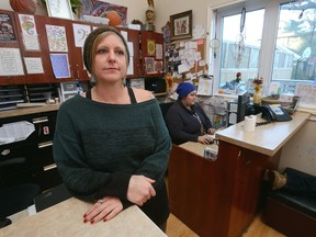 Chuck Lazenby, executive director of the Unity Project in London, at the front desk with Rebecca Waugh. (MORRIS LAMONT/THE LONDON FREE PRESS)