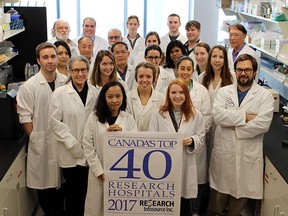 Staff at Health Sciences North and its affiliate, Health Sciences North Research Institute, celebrate their inclusion on the list of Canada’s Top 40 Research Hospitals. (Photo supplied)