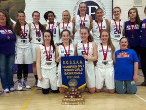 The Lo-Ellen Knights senior girls basketball team celebrates their second city title in a row on Saturday on home court. The Knights defeated Macdonald-Cartier 61-33. Keith Dempsey/For The Sudbury Star