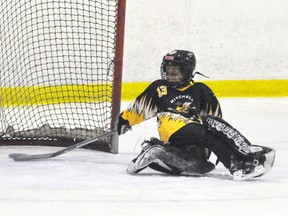 Goalie Kate Nolan of the Mitchell U9 ringette team stretches but can’t quite keep the ring out of the net during action from the gold medal game against Whitby in the London tournament Sunday afternoon. Nolan was outstanding in net as the Stingers won the silver, losing a heartbreaking 7-6 decision in overtime. ANDY BADER/MITCHELL ADVOCATE