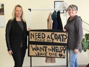Joanne Neimi of Royal Lepage and Chantal Carriere from the Cochrane Times Post stand beside a rack of coats that available to anyone in need in the community. Neimi hopes to be able to have the community donate winter wear to those who do not have any this winter. Drop by the Cochrane Times Post office during office hours: weekdays 9 -12 noon to leave a coat, or take one if needed.