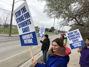 St. Lawrence College students rally for a great voice for students in the ongoing strike by college faculty in Kingston, Ont. on Tuesday, Nov. 14, 2017. Elliot Ferguson/The Whig-Standard/Postmedia Network