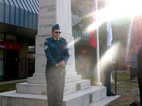 Varnavair 153 Air Cadets, Flight Sergeant Justin Bell and Flight Corporal Jordan Esper, stand watch at the cenotaph Saturday morning, the final shift for 10 air cadets holding a 12-hour Remembrance Day Vigil that began Friday night at 9 p.m. (Chris Abbott/Tillsonburg News)