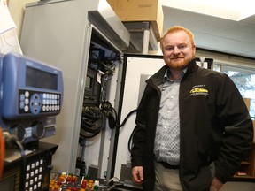 Jason Miller/The Intelligencer
Joe Reid, general manager of transportation and operations, stands next to a traffic control cabinet which houses the electronics used to control traffic lights.