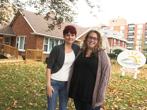 Teresa Ingles and Megan Spizzirri stand outside the home of Deker's Place and the Deker Bauer Foundation in Sarnia Wednesday. The recently opened suicide prevention resource centre is looking for financial help from the City of Sarnia. (Tyler Kula/Sarnia Observer/Postmedia Network)