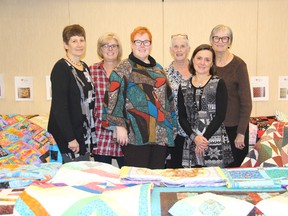 Kelly Schroeder (left), Catherine Sloan, Bonnie Leonard, Nancy Shank, Cathy Harnish and Judith Prior-Kelly came together to make quilts for NEO Kids. (supplied photo)