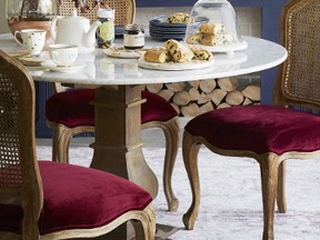 Velvet chairs add a dose of luxe to a dining room. (Homesense)