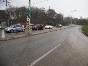 Diverting traffic away from the ultra-steep Snake Hill on Commissioners Road West near Byron would be safer for drivers and also allow public transit to run routes through that section of the city. (Derek Ruttan/The London Free Press)