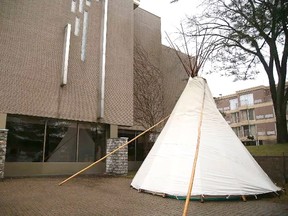 A teepee sits on the lawn of Paroisse Sainte-Anne Des Pins in Sudbury, Wednesday. Four days of hearings for a lawsuit filed by the Robinson-Huron Treaty First Nations are being heard at the nearby Radisson Hotel. Gino Donato/Postmedia