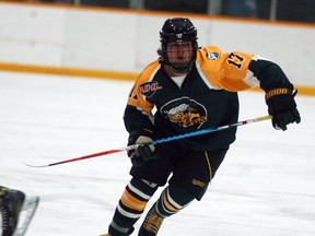 Wallaceburg Lakers player Zachery Hartig skates to the puck during a game against Dresden on Wednesday, Nov. 8, at Wallaceburg Memorial Arena.