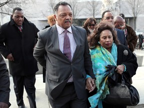 Rev. Jesse Jackson (L) and his wife Jacqueline Lavinia Brown (R) arrive at U.S. District Court for a hearing involving his son, former Rep. Jesse Jackson Jr., February 20, 2013 in Washington, DC. (Photo by Win McNamee/Getty Images)