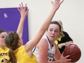 Emilie Lafond, right, of Lo-Ellen Knights, is guarded closely by Hannah Jodoin, of the Korah Colts, during action at the senior girls NOSSA basketball final at Lo-Ellen Park Secondary School in Sudbury, Ont. on Saturday November 18, 2017. John Lappa/Sudbury Star/Postmedia Network