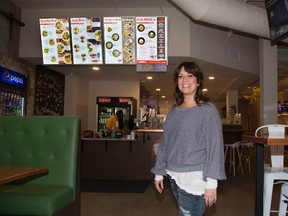 Cathy Doherty has opened a third Wokbox franchise in London, this one on Richmond Row. Head office reluctance about a location without parking was assuaged by the contemporary urban look of the new eatery. (Derek Ruttan/The London Free Press)