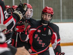 Picton Pirates forward Devin Morrison, seen celebrating a goal earlier this season against the Amherstview Jets, scored in overtime on Thursday night as the Pirates downed the first-place Napanee Raiders 5-4. (Tim Gordanier/The Whig-Standard)