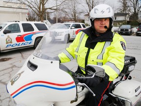 Luke Hendry/The Intelligencer
Belleville Police Const. Brad Stitt sits astride a police motorcycle outside headquarters Monday in Belleville. “Any time we have different classes of vehicles on the road — everybody's got to work cooperatively,” he said. You have to make that eye contact. You have to give enough room and share the roadway."