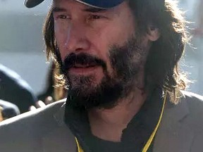 Keanu Reeves looks on at the grid during the MotoGP race during the Comunitat Valenciana Grand Prix - Moto GP at Comunitat Valenciana Ricardo Tormo Circuit on Nov. 12 in Valencia, Spain. (Mirco Lazzari/Getty Images)