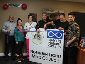 The Northern Lights  Métis Council recently moved their offices from Sixth Avenue to Third Avenue. Attending the grand opening of their new location  at 261 Third Avenue in the lower level was Jamie Mageau from Métis Council, Tracy Kerr of the Métis Family Wellbeing Program, Line Dumont owner of the facility, Darryl Owens Town Councillor, Doug Hull President of the local Métis Council and Hunter Mageau, youth representative.