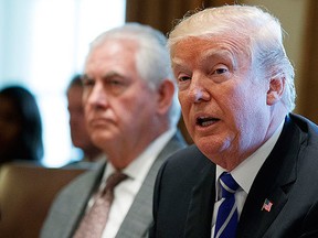 U.S. Secretary of State Rex Tillerson listens as President Donald Trump announces that the United States will designate North Korea a state sponsor of terrorism during a cabinet meeting at the White House, Monday, Nov. 20, 2017, in Washington. (AP Photo/Evan Vucci)
