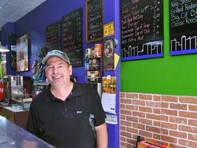 Paul Shettell, owner of the Downtown Deli in Chatham, is shown behind the counter at his restaurant. Shettell will be retiring from the business and closing the deli this Friday.