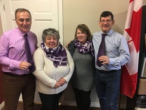 Submitted photo
MPs Neil Ellis (left) and  Mike Bossio (right) recently joined Sandy Watson-Moyles and Kristin Farrell of the Three Oaks Foundation to take a stand as male allies in the fight against gender-based violence.