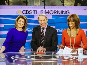This image released by CBS shows, from left, Norah O'Donnell, Charlie Rose and Gayle King on the set of "CBS This Morning." (CBS via AP)