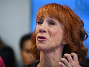 In this June 2, 2017, file photo, comedian Kathy Griffin speaks during a news conference in Los Angeles, to discuss the backlash since Griffin released a photo and video of her displaying a likeness of President Donald Trump's severed head. Griffin said in a YouTube video posted Nov. 18, 2017, that she has been on a “Hollywood blacklist” since the photo was released. (AP Photo/Mark J. Terrill, File)