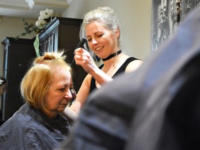 Julie Carr, top, colours Marilyn Sparrow’s hair at St. Thomas’s Dragonfly Salon and Spa. Carr and her team recently won the Contessa 2018 Canadian Hair Stylist competition in Toronto, beating out other salons from across Canada. (Louis Pin/Times-Journal)