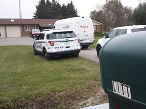 Police activity centred on this house at 2350 Wilton Grove Rd. On Tuesday afternoon in the wake of a shooting. (DAN BROWN, The London Free Press)