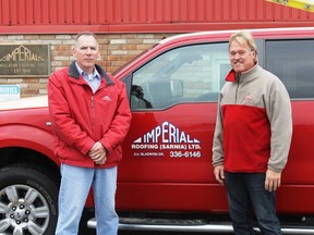 Imperial Roofing's Tom Buhlman and Wayne Dennis stand in front of the company's Gladwish Drive headquarters. The roofing company is celebrating its 70th anniversary this year.
CARL HNATYSHYN/SARNIA THIS WEEK