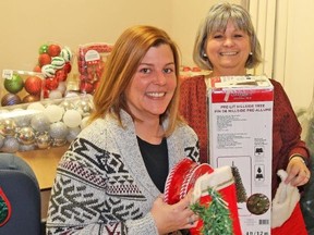 TIM MEEKS/THE INTELLIGENCER
Volunteer coordinator Julie Hutt, left, and Volunteer and Information Quinte executive director Brenda Snider are promoting the annual Christmas Tree Drive, which for more than 15 years has been boosting Christmas spirit for individuals and families by providing them with a tree and decorations.