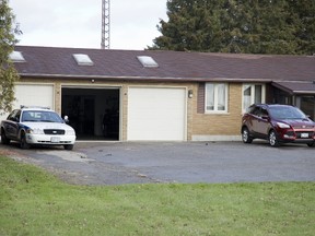 Police were still on the scene Wednesday, a day after a woman was hurt in a shooting and a man found dead near this home at 2350 Wilton Grove Rd. (DEREK RUTTAN, The London Free Press)