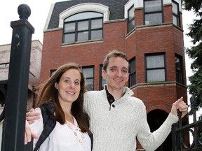Emily and Brian Townsend, who own the top floor unit of a building in Chicago, were surprised by the hidden costs. (Charles Rex Arbogast/The Associated Press)